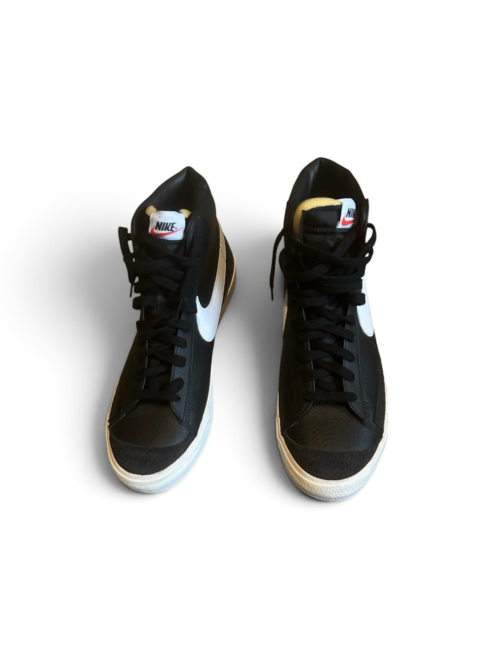 Nike Black and White High-Top Sneakers with Retro Swoosh